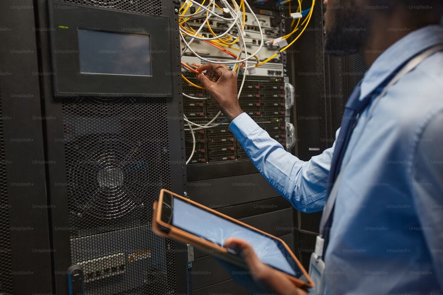 Technician working in a secure server environment